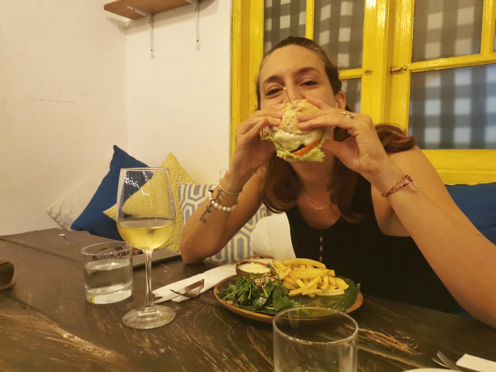 Me happy with a gluten free fish burger in Bali